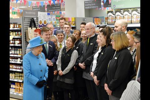 The Queen shares a joke with Waitrose staff during a visit to the grocer’s Poundbury, Dorset, store in October 2016